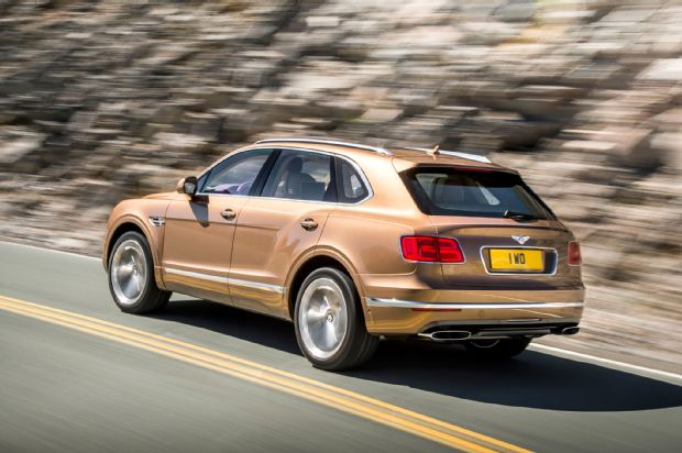 2017 Bentley Bentayga Rear Three Quarter In Motion 02