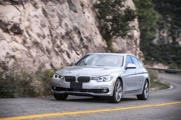 2016 BMW 340i XDrive Front Three Quarters In Motion 03