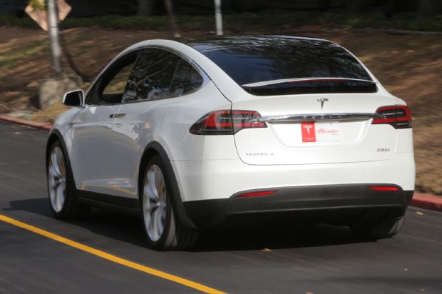 2016 Tesla Model X Rear Three Quarter Motion 2