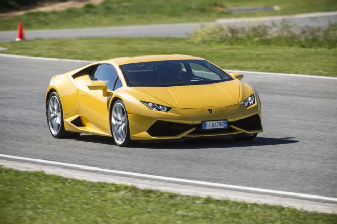 2015 Lamborghini Huracan LP 610 4 Track Yellow Front Three Quarter In Motion1