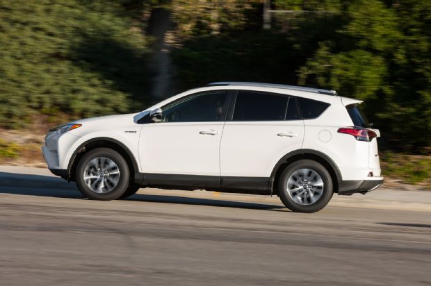 2016 Toyota Rav4 Hybrid XLE Side Profile In Motion 01