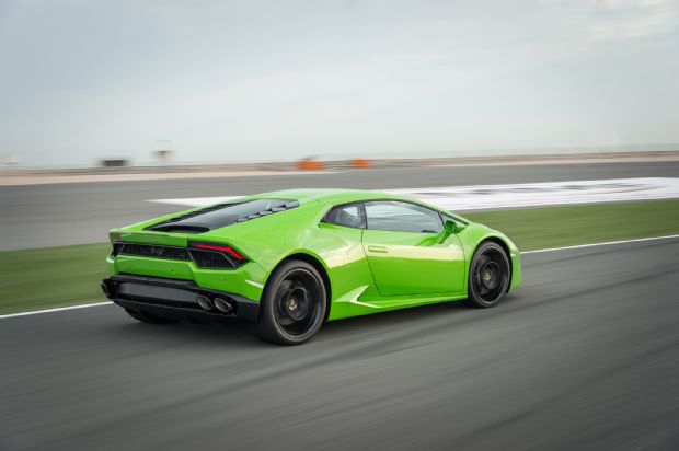 2016 Lamborghini Huracan LP580 2 Rear Three Quarter In Motion 09