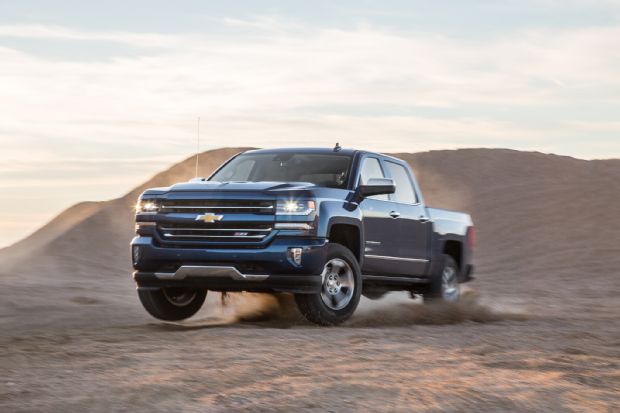 2016 Chevrolet Silverado LTZ Z71 4x4 Front Three Quarter In Motion 02
