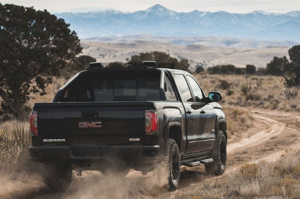 2016 GMC Sierra All Terrain X Rear Three Quarter In Motion