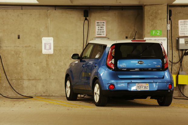 2015 Kia Soul Ev Rear Three Quarters Charging 02
