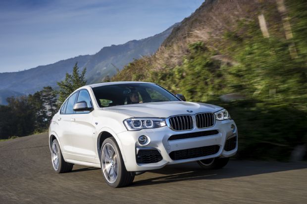 2016 BMW X4 M40i Front Three Quarter In Motion 15