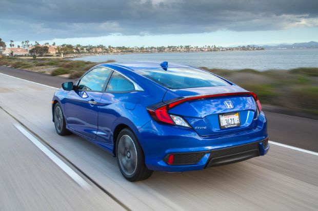 2016 Honda Civic Touring Coupe Rear Three Quarter In Motion
