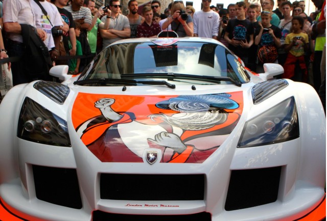 Aleksy Marcinow's tattooed Gumpert Apollo on the 2014 Gumball Rally Aleksy Marcinow's tattooed Gumpert Apollo on the 2014 Gumball Rally