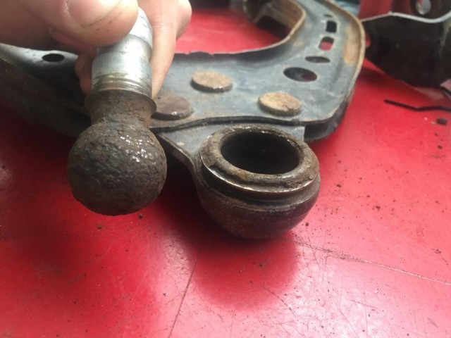 Rusted front suspension ball joint from 2013 Tesla Model S [image: GP Cordaro]