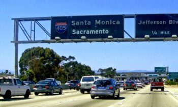 Gas is cheap; U.S. drivers use it to log more miles than ever