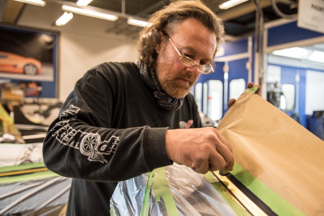 Gold leaf application process at Koenigsegg factory in Ängelholm, Sweden