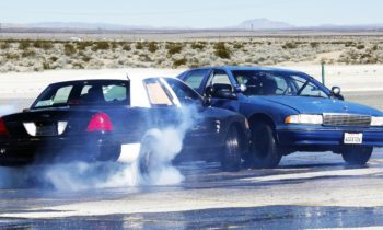 Chevy vs. Ford Cop-Car Thrash Battle! Roadkill Episode 12