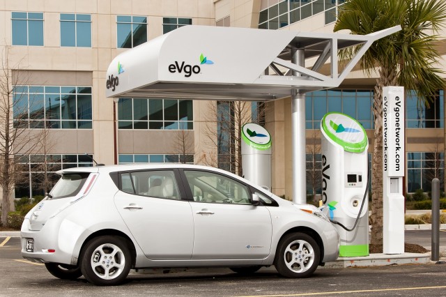Nissan Leaf electric car with eVgo quick charging station. [courtesy eVgo]