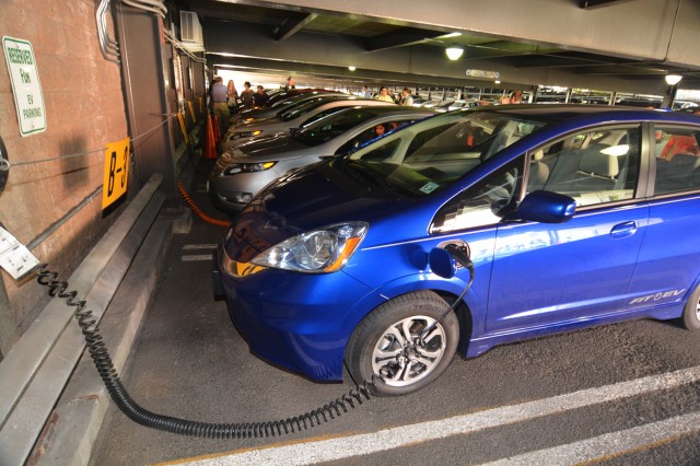 Plug-in electric cars at PSE+G facility in Newark, New Jersey
