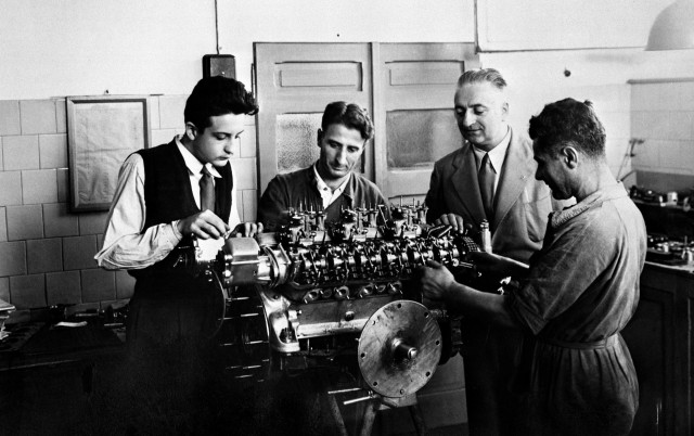 Enzo Ferrari oversees Gioacchino Colombo, Giuseppe Busso and Luigi Bazzi’s work on a V-12 engine