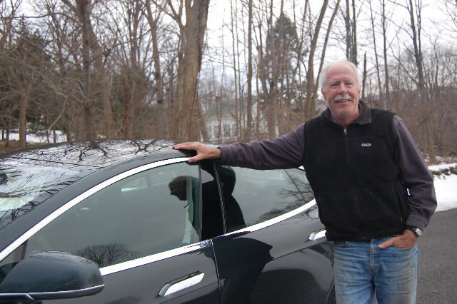 2013 Tesla Model S electric sport sedan on delivery day, with owner David Noland