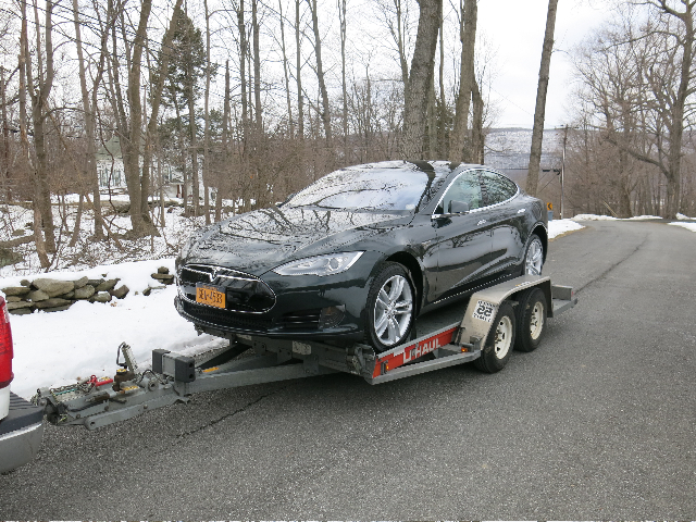 2013 Tesla Model S electric sport sedan on delivery day, with owner David Noland