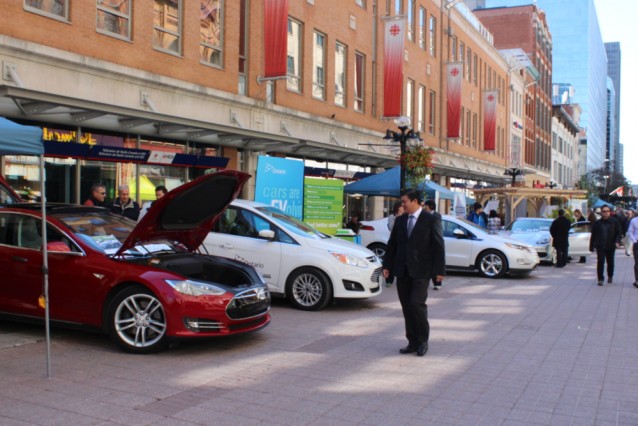 National Drive Electric Week 2014: Eyeing a Tesla in Ottawa. Photo by Ottawa Centre EcoDistrict.