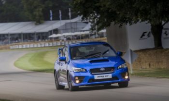 Tackling Goodwood Hill in a right-hand-drive Subaru WRX STI
