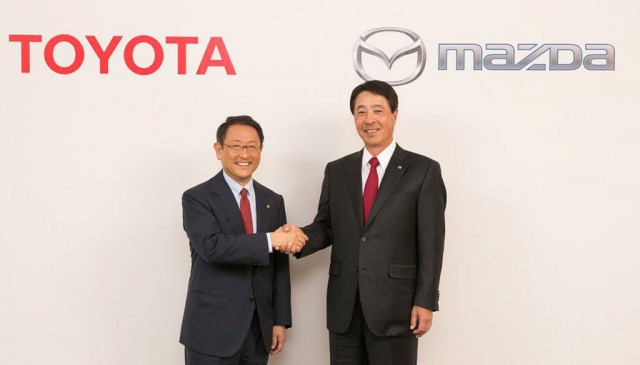 Toyota chief Akio Toyoda (left) and Mazda chief Masamichi Kogai Toyota chief Akio Toyoda (left) and Mazda chief Masamichi Kogai