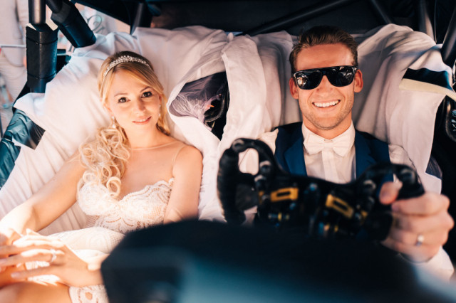 Marco Engel and his wife Steffi drove away from their wedding in a Mercedes-Benz DTM race car