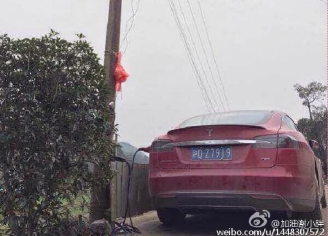 Tesla Model S charging from public electric network, Sichuan Province, China [photo: Car News China]