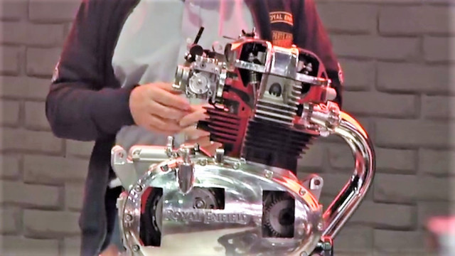 The new 650cc twin-cylinder engine is shown in a cutaway model