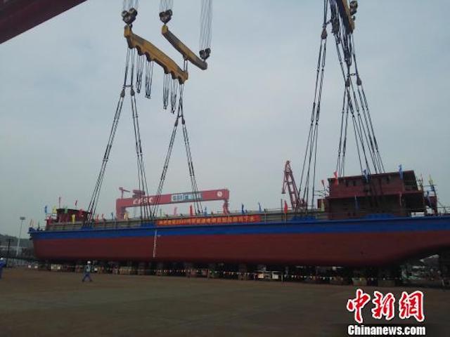 China’s all-electric cargo ship will deliver coal to powerplants. China News/Peng Yonggui