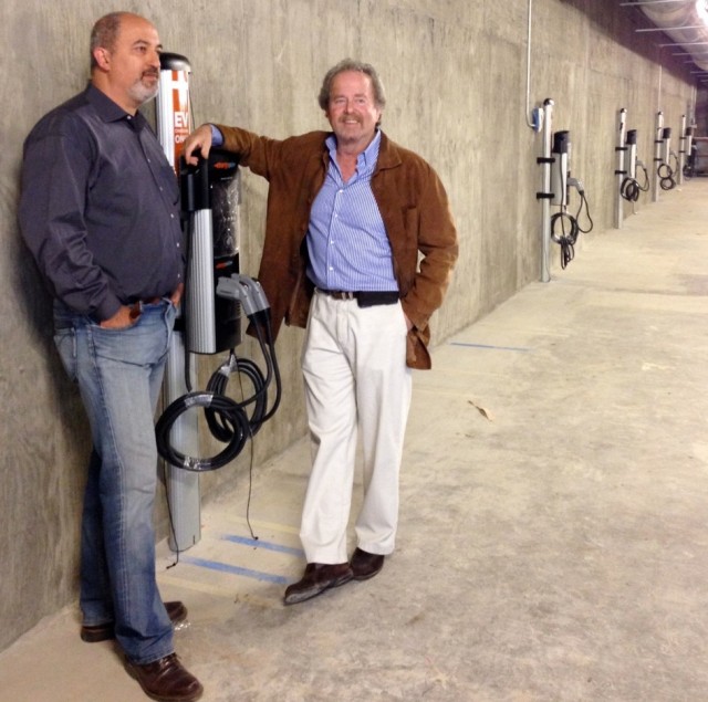 Electric-car charging stations in Linear City rental building, Los Angeles, with developers
