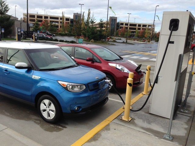 2015 Kia Soul EV and 2014 Nissan Leaf, at Blink DC fast charger - Fife, WA