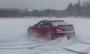 Ansel Elgort, aka Baby Driver, drifts his Subaru WRX in the snow