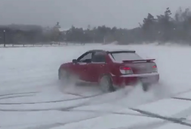 Ansel Elgort, aka Baby Driver, drifts his Subaru WRX in the snow