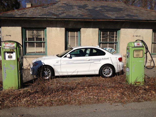 BMW ActiveE electric car in front of old gas pumps, Belvidere, NJ [photo: Tom Moloughney]
