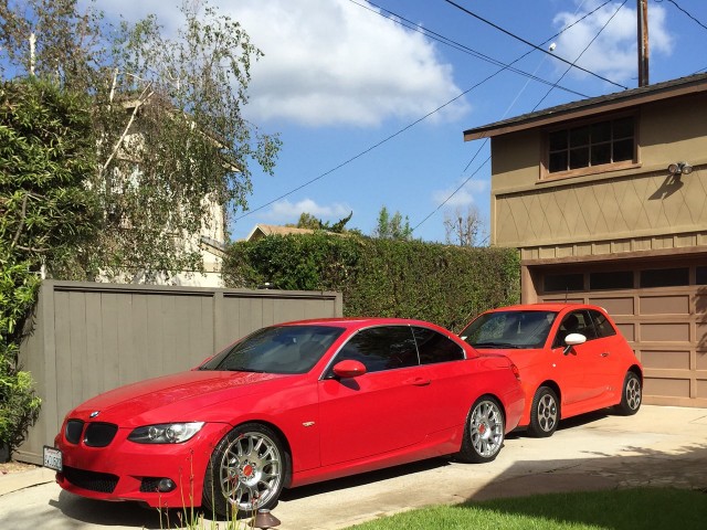 2007 BMW 335i and 2015 Fiat 500e electric car in driveway, May 2015 [photo: Chris Baccus]