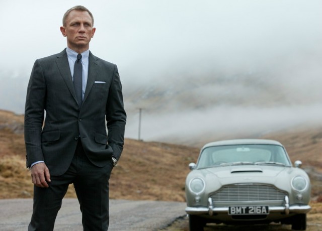 Daniel Craig as James Bond, Agent 007, in Skyfall, with Aston Martin DB5