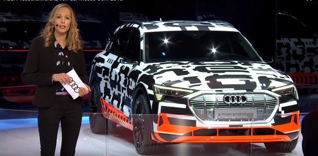Camouflaged 2019 Audi e-tron electric SUV on stage at 2018 Geneva auto show