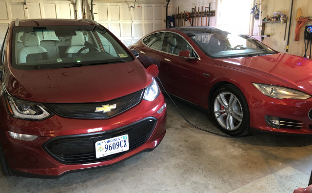 Charging 2017 Chevrolet Bolt EV and 2015 Tesla Model S P85D at home in garage [photo: Jay Lucas]