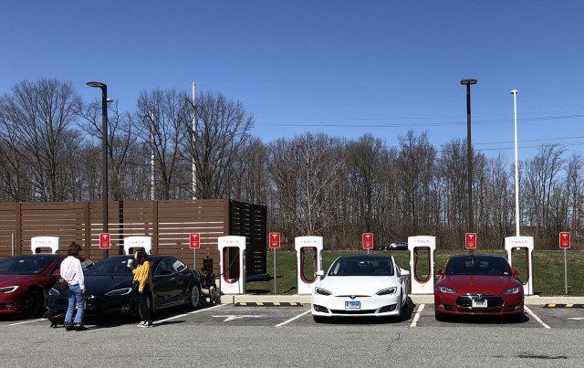 Tesla electric cars at Supercharger fast-charging site, TK  [photo: Jay Lucas]