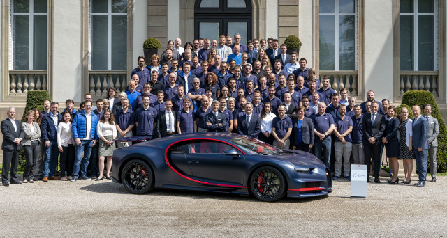 Bugatti staff and the 100th Chiron at Bugatti’s headquarters in Molsheim, France Bugatti staff and the 100th Chiron at Bugatti’s headquarters in Molsheim, France