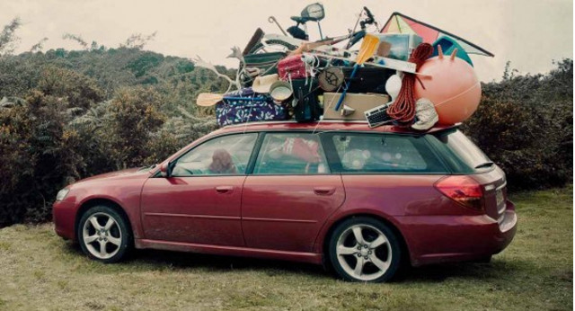 Overloaded Subaru Legacy with stuff on roof Overloaded Subaru Legacy with stuff on roof
