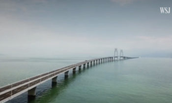 China opens world's longest sea-crossing bridge