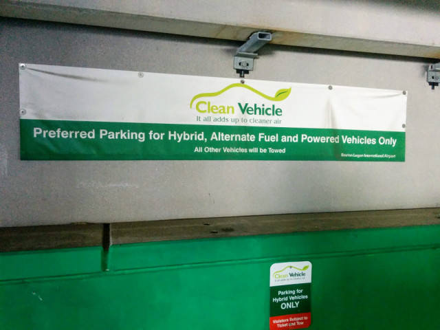 Previous sign at Boston Logan airport restricting green car parking to hybrids [CREDIT: John Briggs]