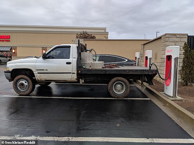 Dodge flatbed blocking a Tesla Supercharger in Tennessee, fake charging [CREDIT: freckletan, Reddit]
