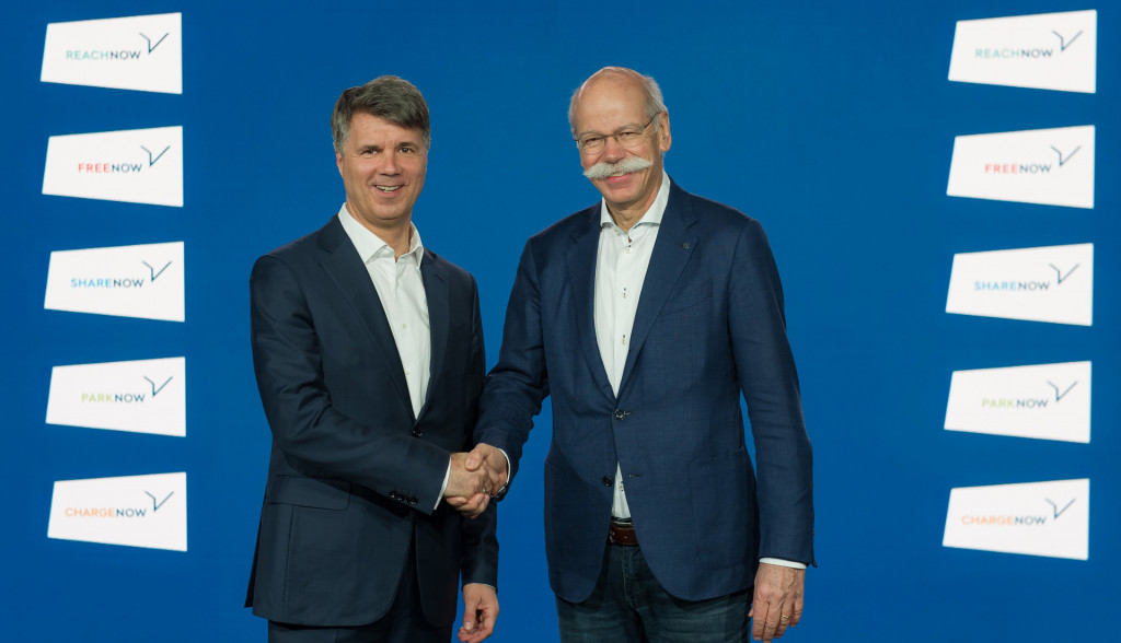BMW Group CEO Harald Krüger (left) and Daimler CEO Dieter Zetsche