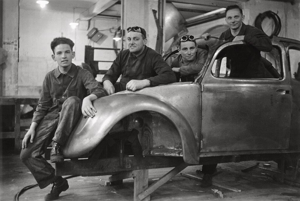 Reutter craftsmen work in 1938 on a prototype for the Volkswagen Type 1