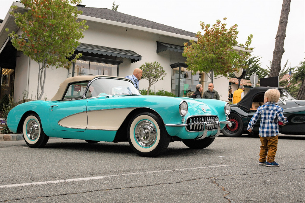 A Corvette at the Concours on the Avenue draws the attention of an admirer | Rebecca Nguyen photo