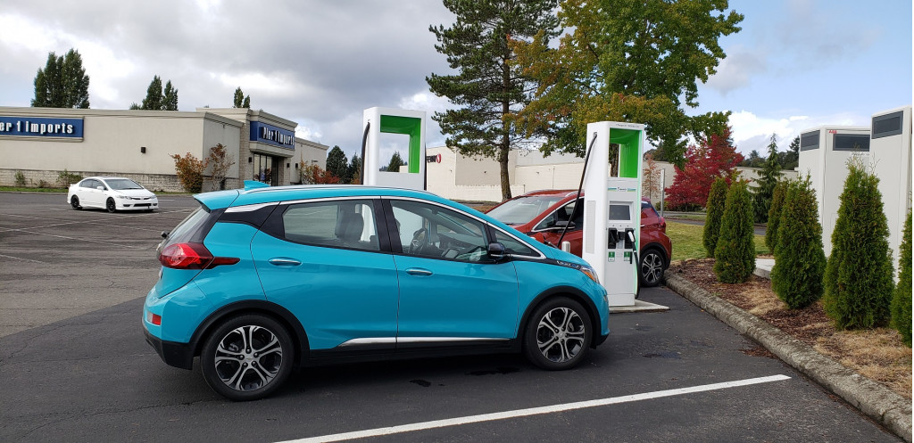 2020 Chevrolet Bolt EV charging at Electrify America site, Kelso, Washington