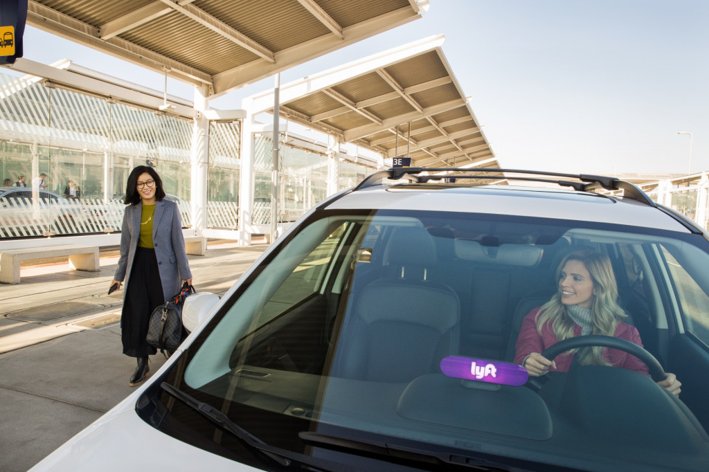 Lyft car picking up a rider