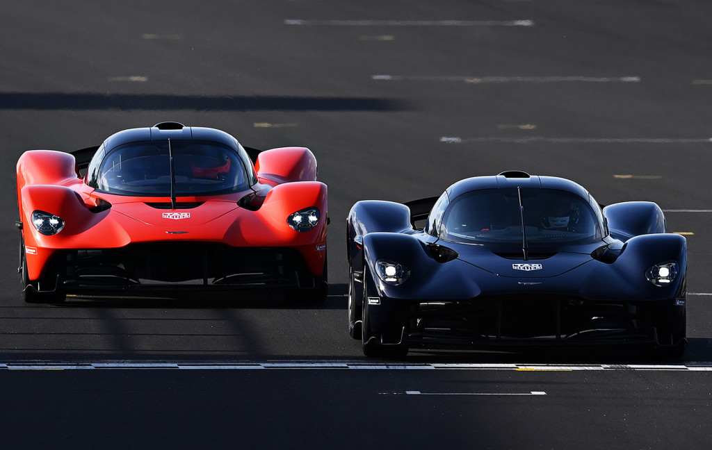 Red Bull Racing F1 drivers Max Verstappen (left) and Alex Albon test the Aston Martin Valkyrie
