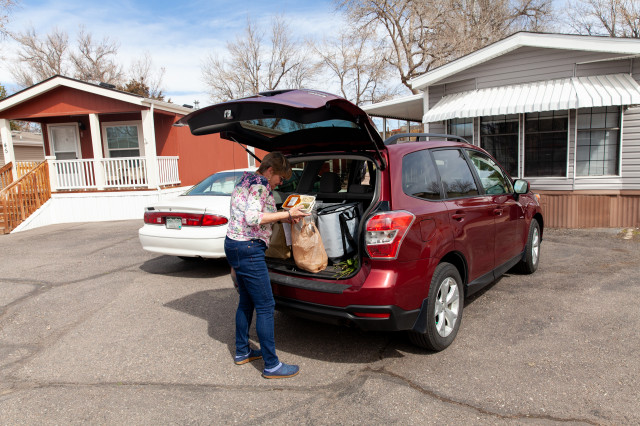 Kathy Kreidler packages a Meals on Wheels delivery April 1, 2020. 